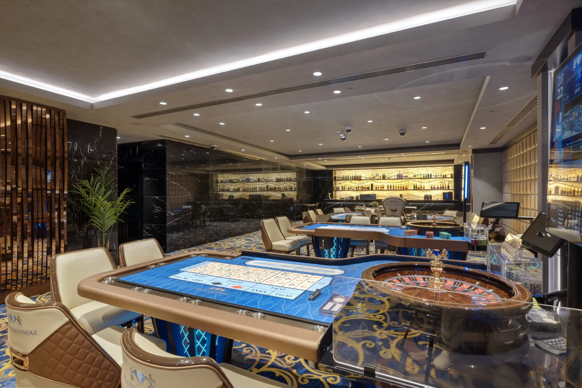 Salon with roulette and card tables