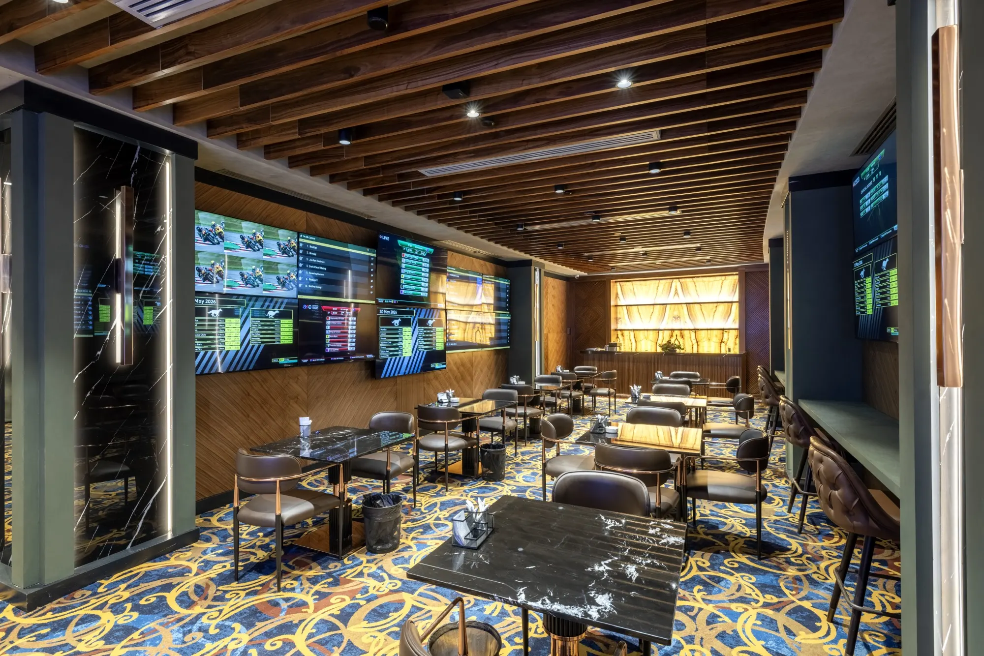 Sports lounge with large video walls